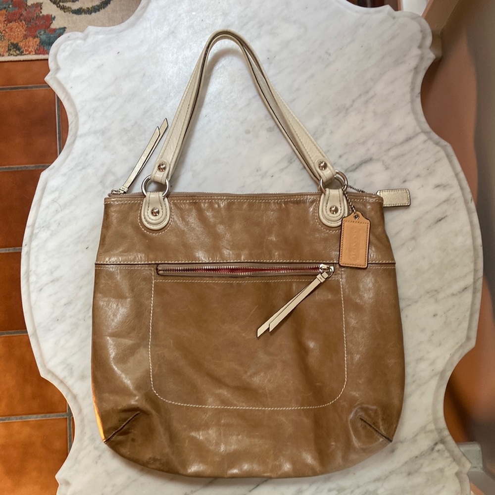 Coach Distressed leather tan bag with melon interior